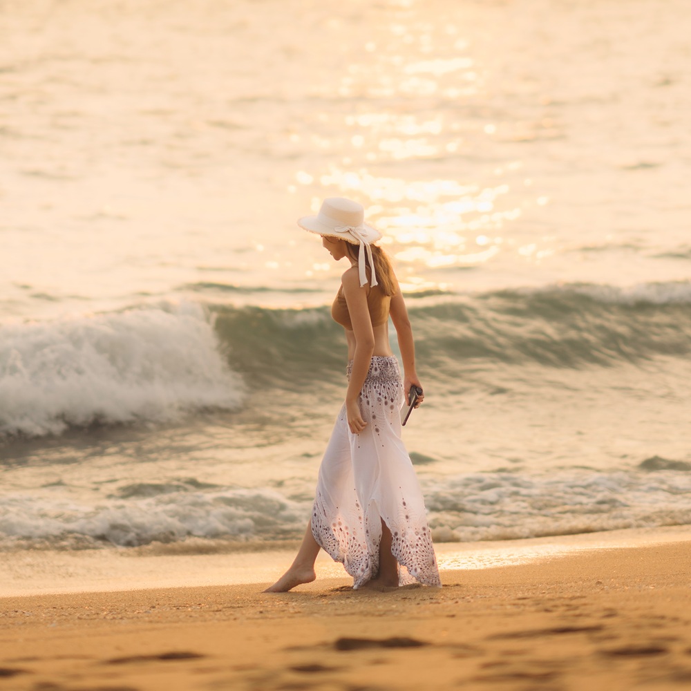 Walking at the beach in Estella Mai Khao Beach Resort in Phuket